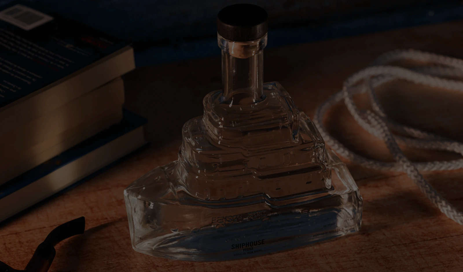 a glass ship shaped vodka bottle